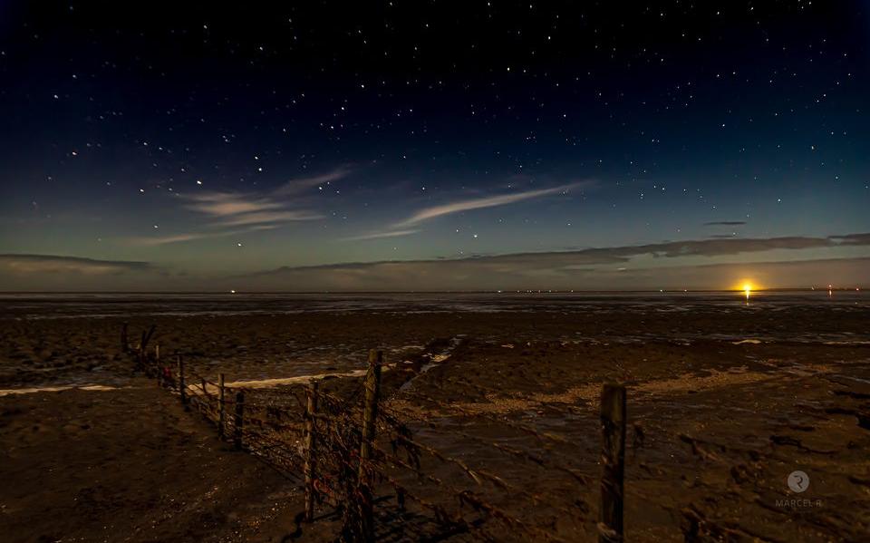 De sterrenhemel boven het wad.