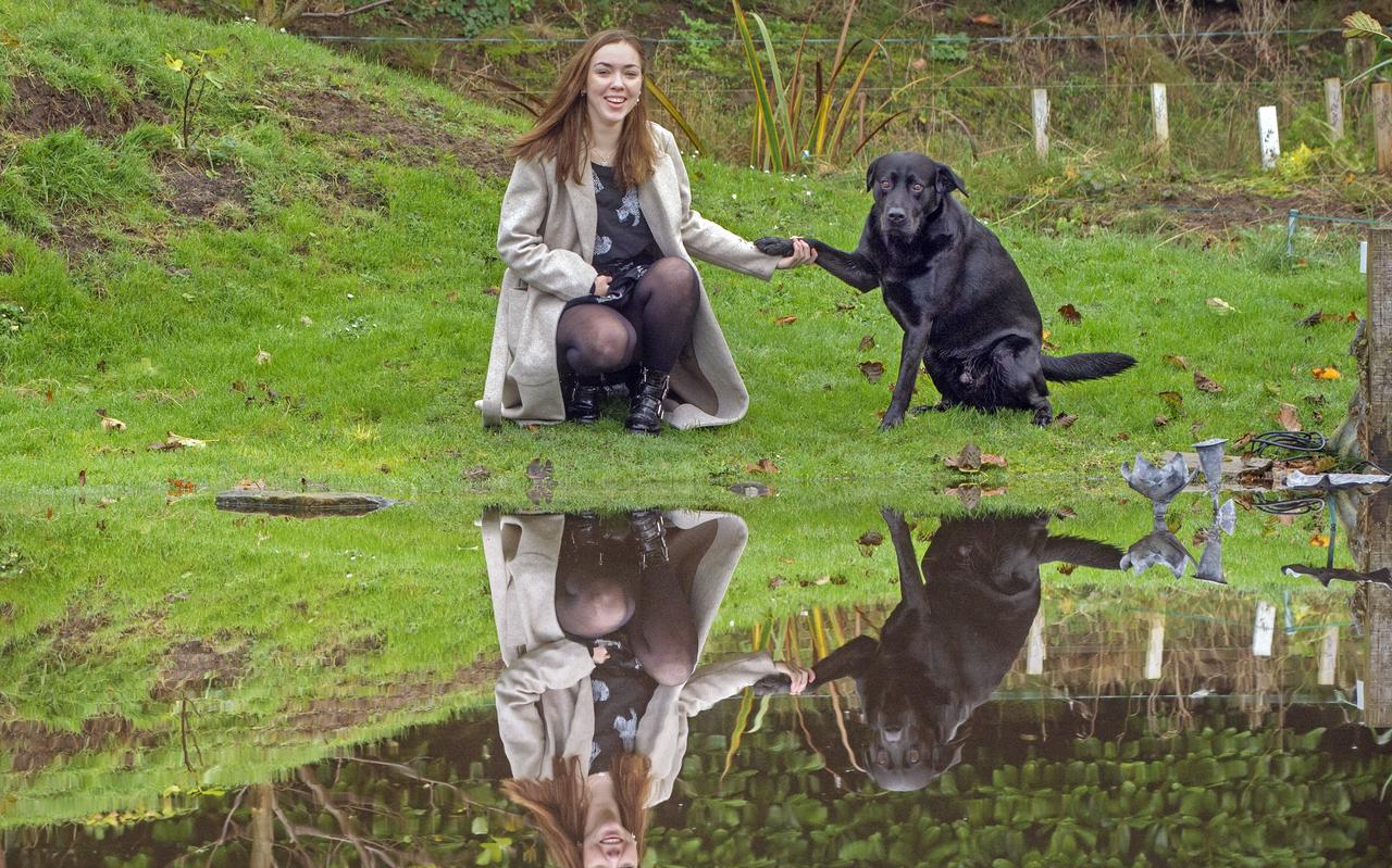 Samantha Lautenbach met hond Snow. Samantha Lautenbach met hond Snow.