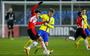 Jamie Jacobs van SC Cambuur vecht een duel uit met PSV' er Joel Piroe