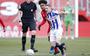 Tibor Halilovic van SC Heerenveen in duel met FC Twente-speler Godfried Roemeratoe.