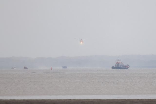 Reddingsactie voor wadlopers in nood onder Ameland